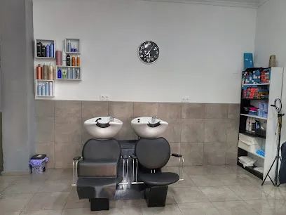 J.S Peluqueros unisex