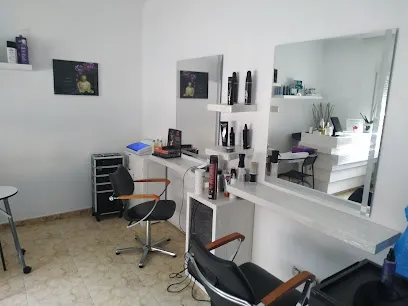 PELUQUERIA CRYSTAL