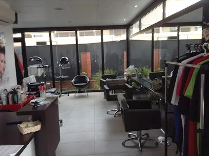 Perruqueria i Estètica Unisex MIA