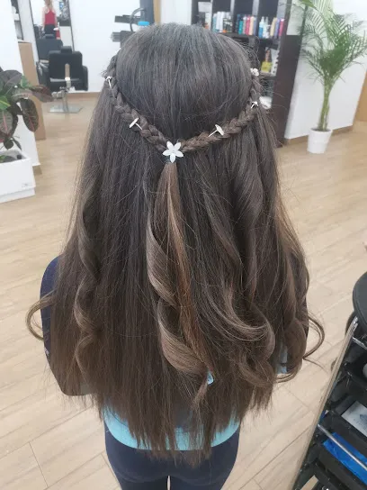 Reinvéntate Peluquería
