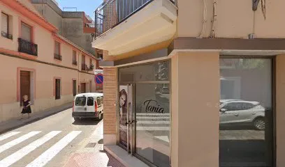 Tania Perruqueria dona i home