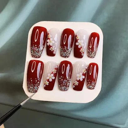 Uñas E